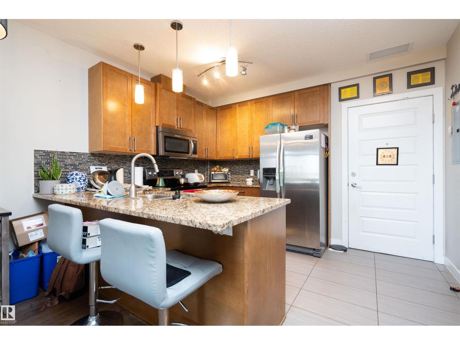 #610 5151 WINDERMERE BV SW — photo 11 of 37