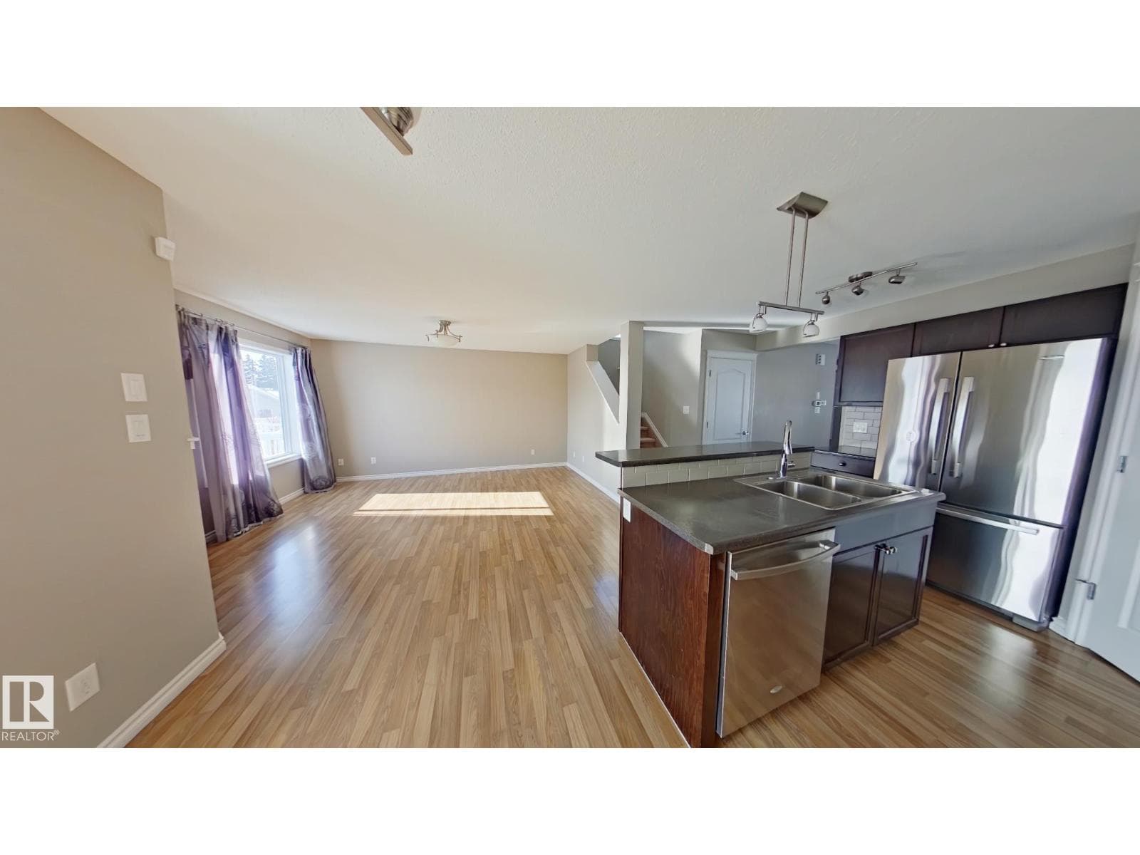 7665 Schmid CR NW — photo 4 of 8