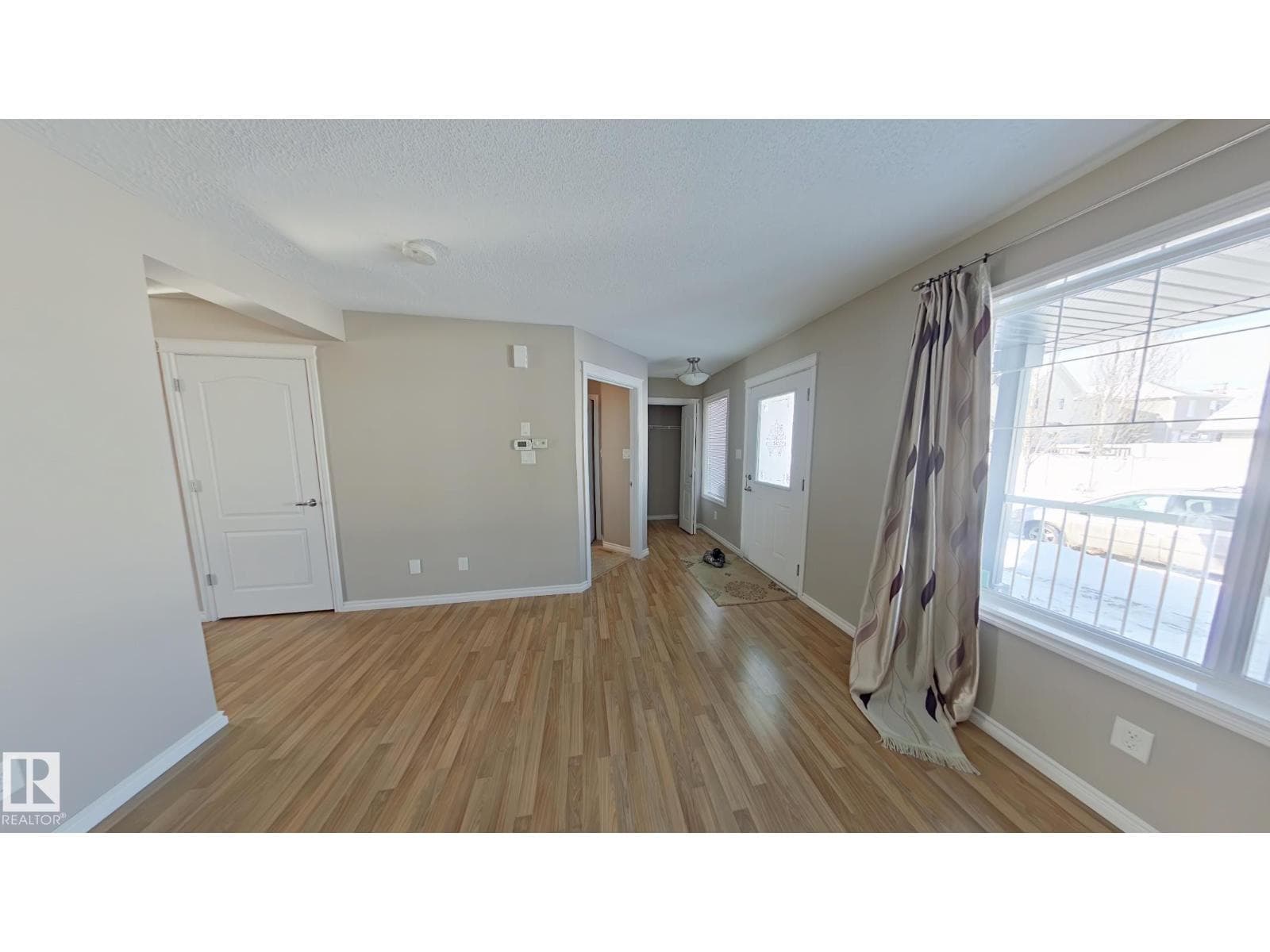 7665 Schmid CR NW — photo 2 of 8